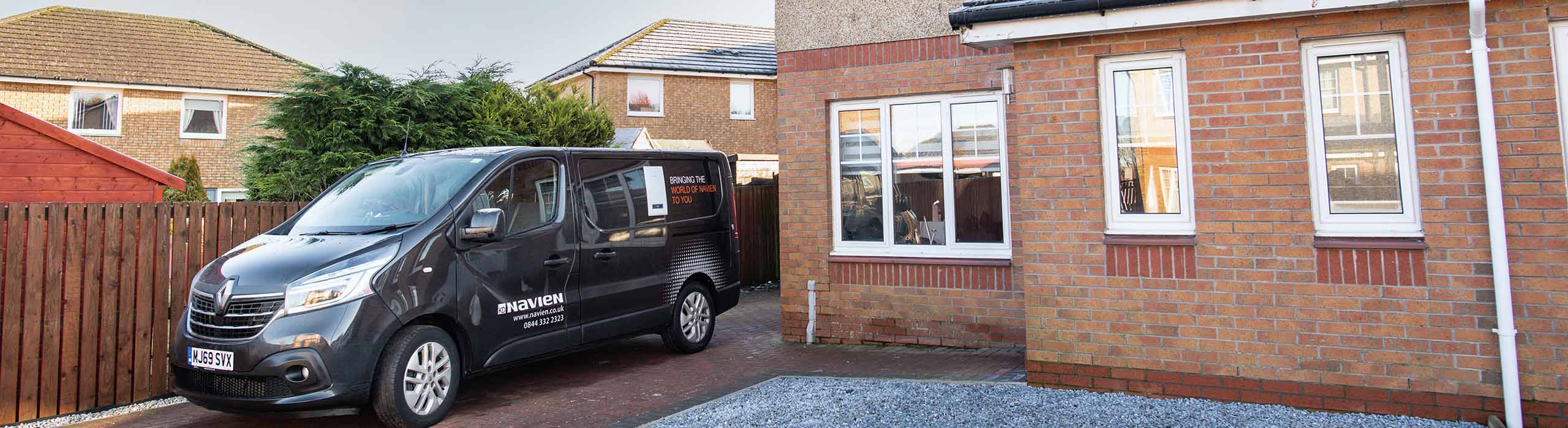 Navien van outside a home