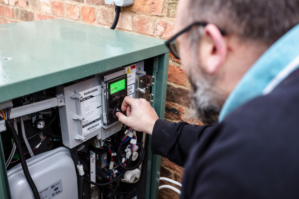 A Navien installer using the display of the LCB700